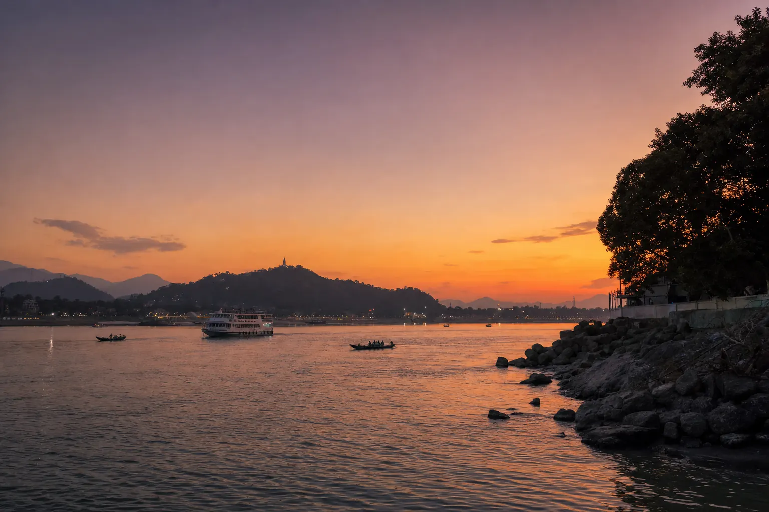 Ferries on the Brahmaputra at Guwahati as the sun sets