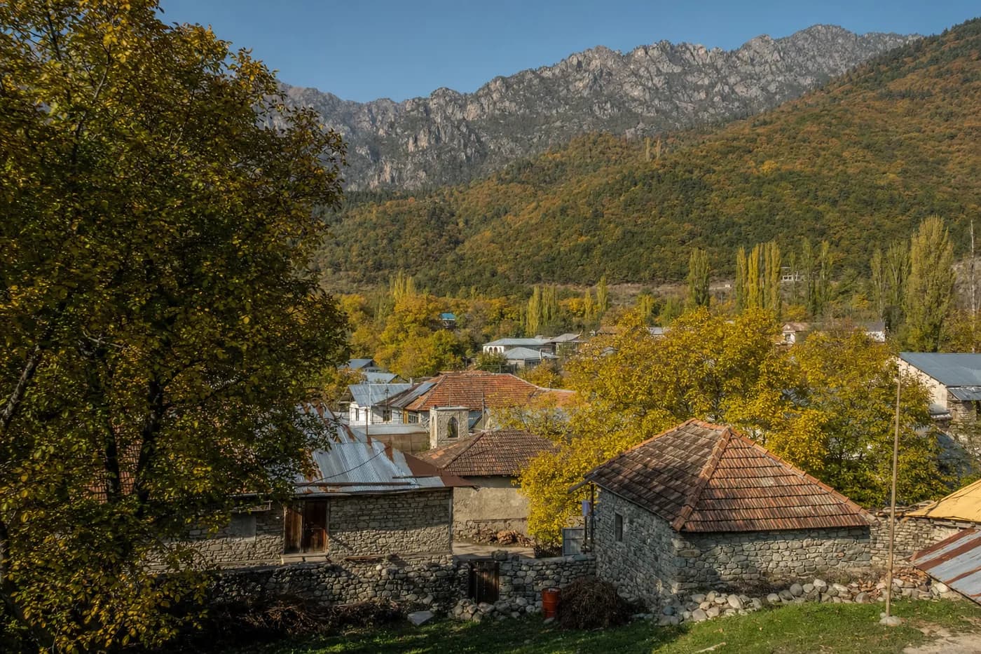 A stone village in the Caucasus foothills in autumn